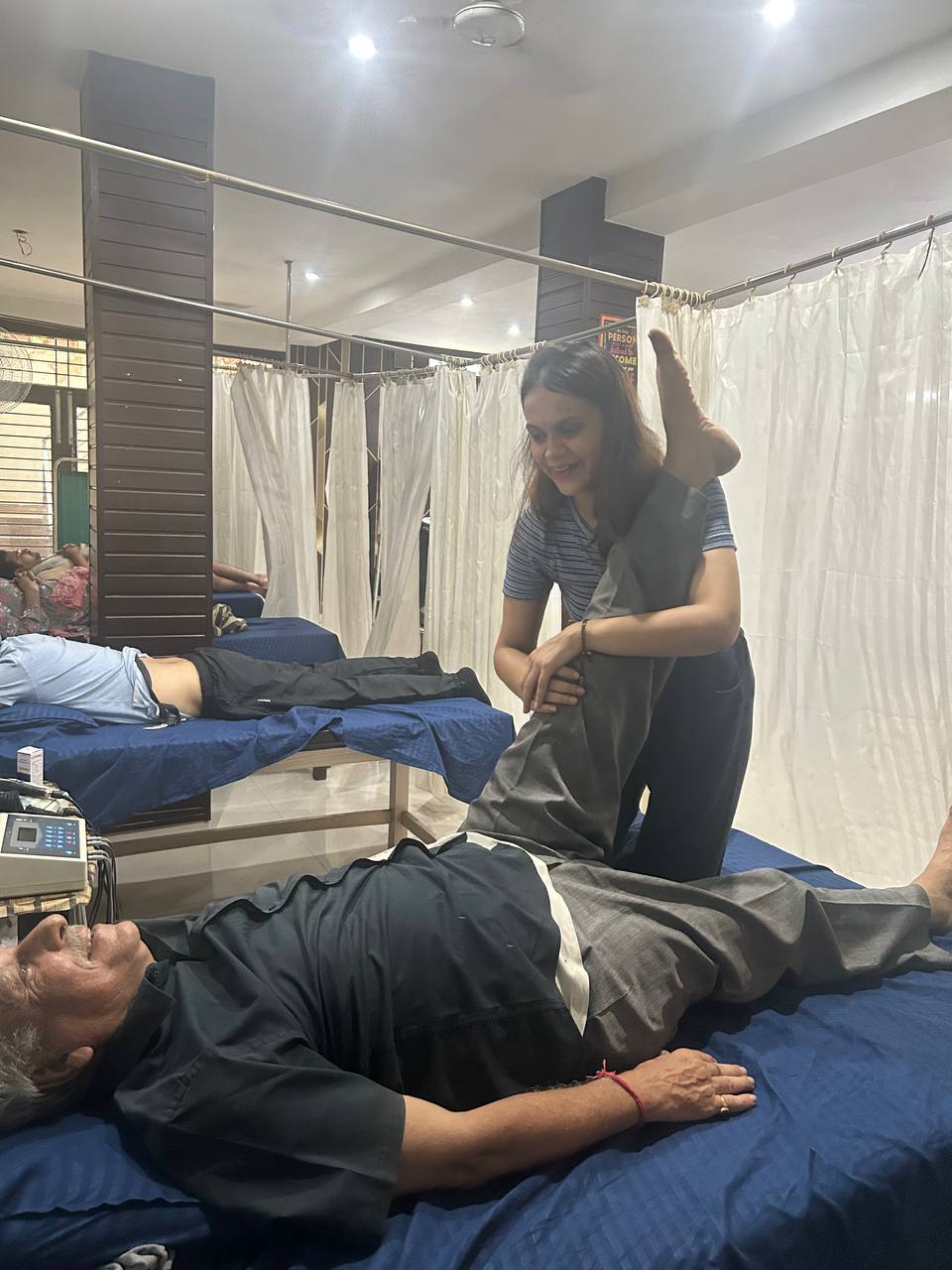 Patient doing guided exercises with a resistance band